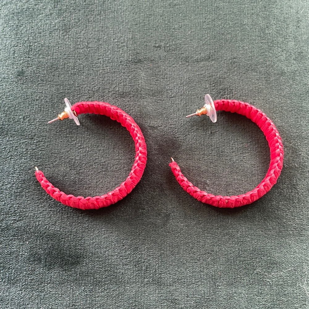 Red hoop earrings